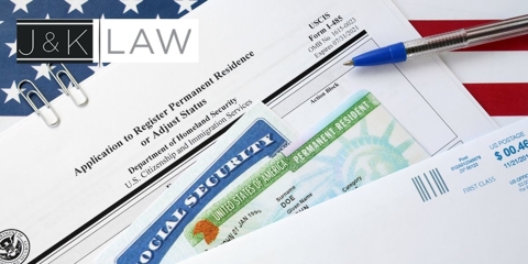 various visa document application and U.S flag in the back